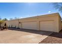 Well-maintained two-car garage with neutral doors and private driveway at 4621 E Onyx Ave, Phoenix, AZ 85028