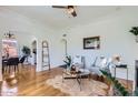 Bright living room with hardwood floors, neutral paint, and stylish decor at 2209 N 8Th St, Phoenix, AZ 85006