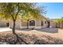 Charming single-story home with low maintenance gravel landscaping and a two-car garage at 23402 N 22Nd Way, Phoenix, AZ 85024