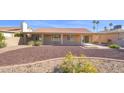 Backyard featuring a covered patio and desert landscaping at 25822 S Eastlake Dr, Sun Lakes, AZ 85248