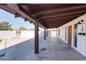 Spacious covered patio ideal for outdoor entertaining with views of the yard at 350 N 9Th St, Coolidge, AZ 85128