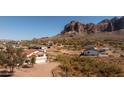 Stunning desert home with mountain views showcasing the surrounding neighborhood and desert landscaping at 5556 E Singletree St, Apache Junction, AZ 85119