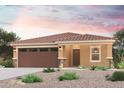 Charming single-story home featuring a brown tile roof, landscaped front yard, and a two-car garage at 1389 W Hopi Dr, Coolidge, AZ 85128