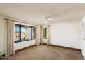 Bright bedroom with large windows providing ample natural light and views of the surrounding area at 17037 E El Pueblo Blvd, Fountain Hills, AZ 85268