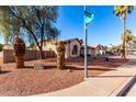 View of the house from the corner with a view of the address on the curb at 2716 N Kristen --, Mesa, AZ 85213