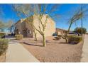 Community townhome with desert landscaping. A serene residential community provides a relaxed lifestyle at 2277 S Apache Dr # 7, Apache Junction, AZ 85120
