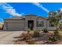 Charming home featuring neutral stucco, desert landscaping, a tiled roof, and a spacious two-car garage at 30838 W Avalon Ct, Buckeye, AZ 85396