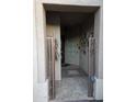 View of the front entryway with tile floors, decor, and secure gate at 5405 S Marigold Way, Gilbert, AZ 85298