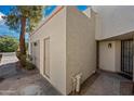 Close up on the exterior of the property showcasing the front entrance, door, and desert style architecture at 985 N Granite Reef Rd # 127, Scottsdale, AZ 85257