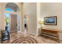 Bright entryway showcasing decorative tiled floor, high ceilings, and natural light, creating a welcoming atmosphere at 11627 E Bella Vista Dr, Scottsdale, AZ 85259