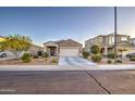 Charming single-story home with a well-manicured front yard at 30945 W Picadilly Rd, Buckeye, AZ 85396