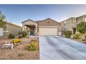 Attractive home with desert landscaping and a spacious two-car garage at 30945 W Picadilly Rd, Buckeye, AZ 85396