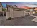 A two car garage and brick paver driveway at 4669 E Olney Ave, Gilbert, AZ 85234