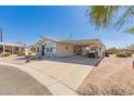 Well maintained home with a covered carport and easy desert landscaping at 8500 E Southern Ave # 551, Mesa, AZ 85209