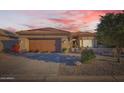 Charming single-story home features a well-kept yard, desert landscaping, and a warm, inviting facade at 9130 E Crystal Dr, Sun Lakes, AZ 85248