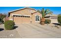 Charming single-story home featuring a well-maintained front yard and a two-car garage at 1013 S Hazel Ct, Gilbert, AZ 85296