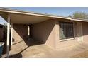 Features a covered carport providing shade and protection for vehicles at 1950 E Wier Ave, Phoenix, AZ 85040