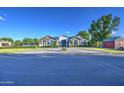 Charming single-story home features an expansive front yard with circular driveway at 22406 S 173Rd Way, Gilbert, AZ 85298