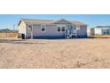 Attractive single-story home with a simple facade and minimalist landscaping at 38203 W Willetta St, Tonopah, AZ 85354