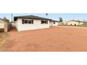 An updated single-story home featuring a xeriscaped yard at 556 E Manor Dr, Casa Grande, AZ 85122