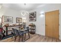 Bright dining room with a modern light fixture and decorations at 7127 E Rancho Vista Dr # 2003, Scottsdale, AZ 85251