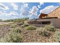 Inviting entrance to Northpointe community with lush landscaping and scenic views at 13224 W Crimson Ter, Peoria, AZ 85383