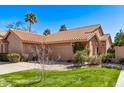 Well-maintained single-Gathering home with desert landscaping, tile roof, and an attached two-car garage at 13425 N 92Nd Pl, Scottsdale, AZ 85260