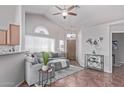 Bright living room with vaulted ceiling, neutral color palette, and stylish decor at 13425 N 92Nd Pl, Scottsdale, AZ 85260