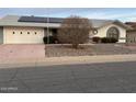 Charming single-story home featuring a two-car garage and low-maintenance desert landscaping at 13914 W Terra Vista Dr, Sun City West, AZ 85375