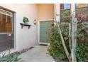 Inviting home entrance with a decorative door, Southwestern flora, and stylish exterior decor at 1920 E Maryland Ave # 16, Phoenix, AZ 85016