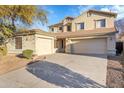 Spacious driveway leading to a three-car garage offering ample parking at 3524 W Alyssa Ln, Phoenix, AZ 85083