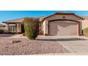 Charming single-story home with desert landscaping and a two-car garage at 3792 E Westchester Dr, Chandler, AZ 85249