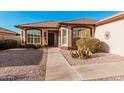 Inviting home entrance with well-maintained desert landscaping at 3792 E Westchester Dr, Chandler, AZ 85249