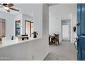 Bright living room with neutral tones and seamless flow into the dining area create a comfortable and stylish living space at 2989 N 44Th St # 3016, Phoenix, AZ 85018