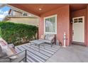 Inviting covered porch with seating area, perfect for relaxing outdoors at 3117 E Sagebrush St, Gilbert, AZ 85296