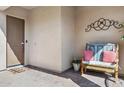 Inviting entryway with a decorative bench and an interesting wall decoration at 1646 N Channing --, Mesa, AZ 85207
