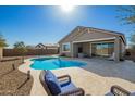 A refreshing, private backyard pool perfect for relaxing and entertaining at 18006 W Hess St, Goodyear, AZ 85338