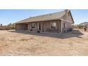 Cozy home with a covered patio area, ideal for outdoor seating and enjoying the desert scenery at 36249 N 7Th St, Phoenix, AZ 85086