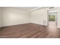 Bright and airy living room with hardwood floors, ready for personalization at 4003 S Mill Ave, Tempe, AZ 85282
