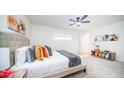 Cozy bedroom features neutral decor, plush carpet, and ample natural light at 7928 N 46Th Ave, Glendale, AZ 85301