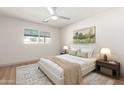 Cozy bedroom with a comfortable bed, soft lighting, and a view of the outdoors at 8732 E Forest Dr, Scottsdale, AZ 85257
