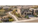 Suburban home with a tile roof, desert landscaping, a private backyard pool, and a paved sidewalk at 18811 W San Miguel Ave, Litchfield Park, AZ 85340