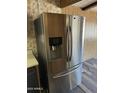 Close-up of the Samsung stainless steel refrigerator, complete with water and ice dispenser at 3330 E Main St # 323, Mesa, AZ 85213