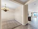 Traditional dining room space with carpet and chandelier at 3443 S California St, Chandler, AZ 85248