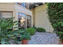 Beautifully landscaped patio featuring stone pavers and lush greenery at 5825 N 12Th St # 3, Phoenix, AZ 85014