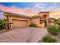 Beautiful home featuring a three-car garage, desert landscaping, and a private drive at 7705 E Doubletree Ranch Rd # 29, Scottsdale, AZ 85258