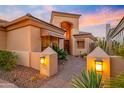 Stunning home front entrance featuring manicured desert landscaping and a private walkway at 7705 E Doubletree Ranch Rd # 29, Scottsdale, AZ 85258