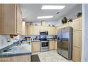 Well-lit kitchen equipped with stainless steel appliances and plenty of cabinet space at 8500 E Southern Ave # 463, Mesa, AZ 85209