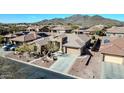 Overhead view of home showcasing driveway, desert landscaping and a great neighborhood at 1320 W Whitman Dr, Anthem, AZ 85086