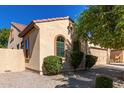 Exterior shot showcasing the architectural details and a tiled roof at 16966 W Rio Vista Ln, Goodyear, AZ 85338